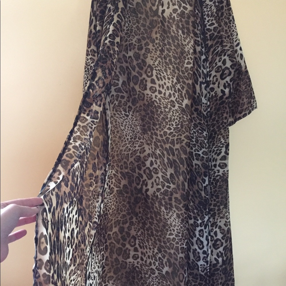 Long leopard cardigan looks great on !